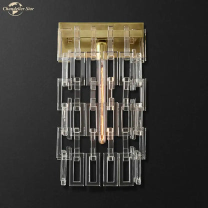 Modern brass and crystal wall sconce with clear acrylic geometric bars and exposed filament bulb for living room decorbites crystal wall