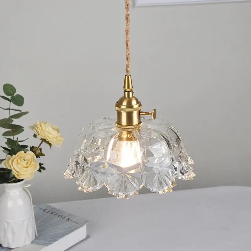 Modern brass and cut glass led pendant light with faceted glass and brass finish for dining room lighting