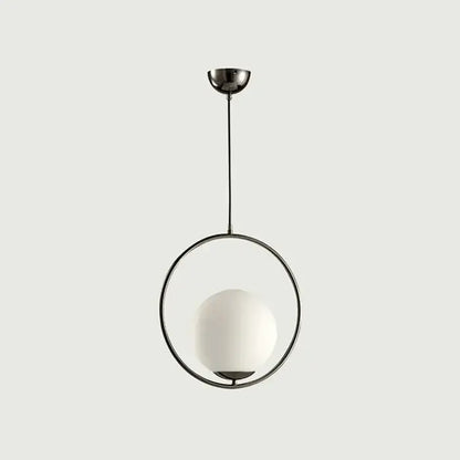 Modern brass and frosted glass ball pendant light with sleek black metal ring and opaque white globe decorbites glass ball light fixture