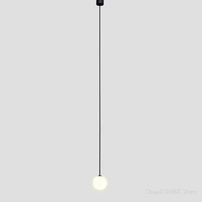 Minimalist black pendant light with a sleek spherical frosted glass ball pendant from decorbites glass ball collection