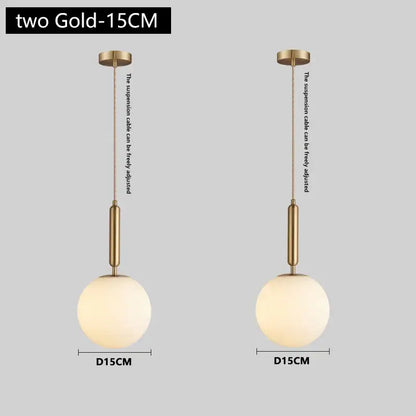 Modern brass and frosted glass pendant light with spherical globes and adjustable cables for dining room chandelier pendant light