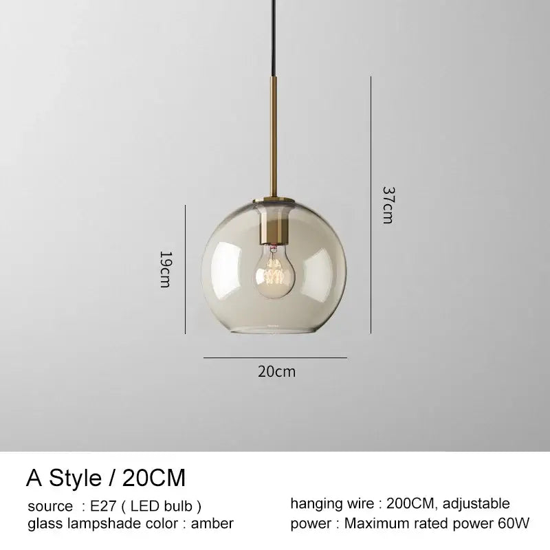 Modern brass and glass pendant light with spherical amber glass shade and e27 led bulb for kitchen and dining room