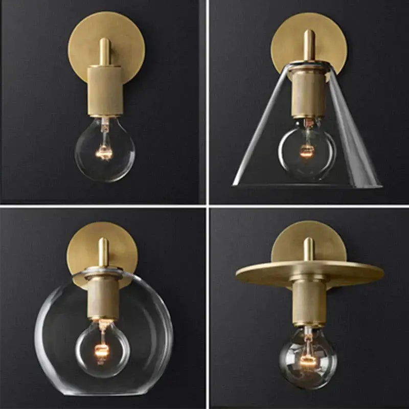 Modern brass and glass wall sconce featuring brass finish with clear glass shades and exposed bulb design for bedroom lighting