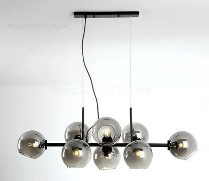 Modern black metal pendant lights with seven smoked gray glass globe shades for kitchen dining room lighting