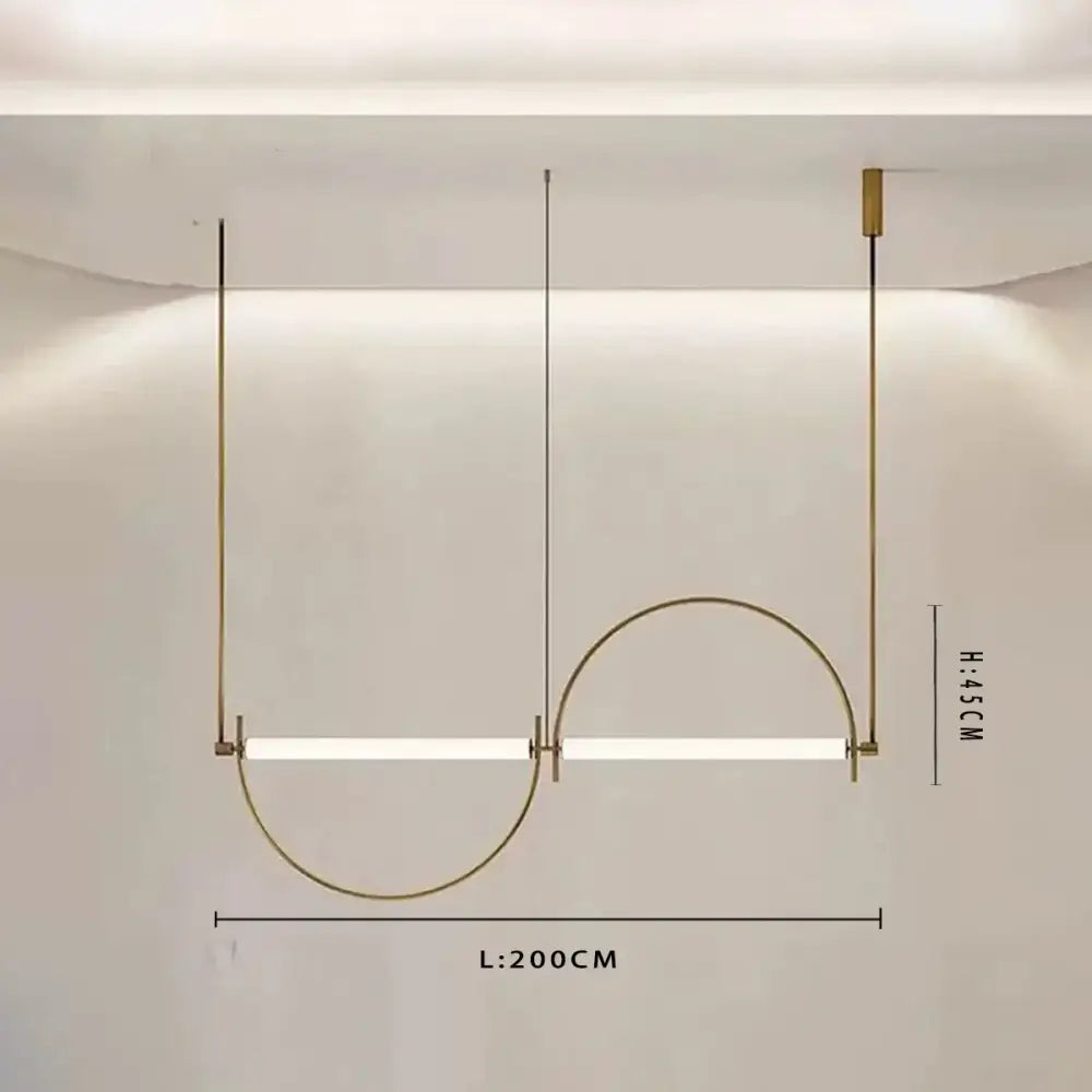 Modern brass and polished chrome pendant light with two horizontal led bars and curved brass arch in warm metallic finish