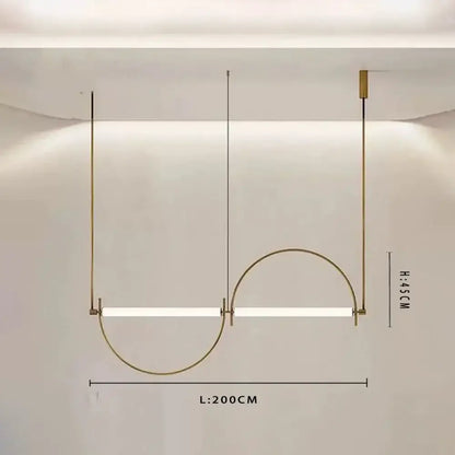 Modern brass and polished chrome pendant light with two horizontal led bars and curved brass arch in warm metallic finish