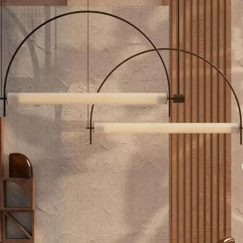 Modern minimalist pendant light with sleek black metal arcs frosted glass and polished chrome finish for dining room