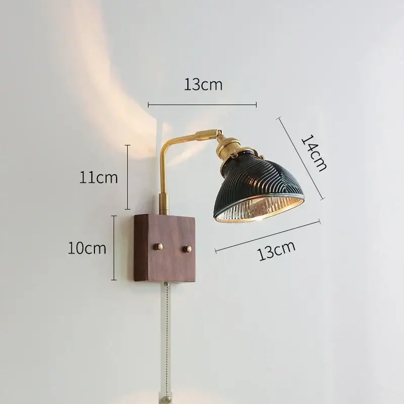 Modern brass wall light with dark green ribbed glass shade and brass-finished metal arm for bedroom decorbites clear glass