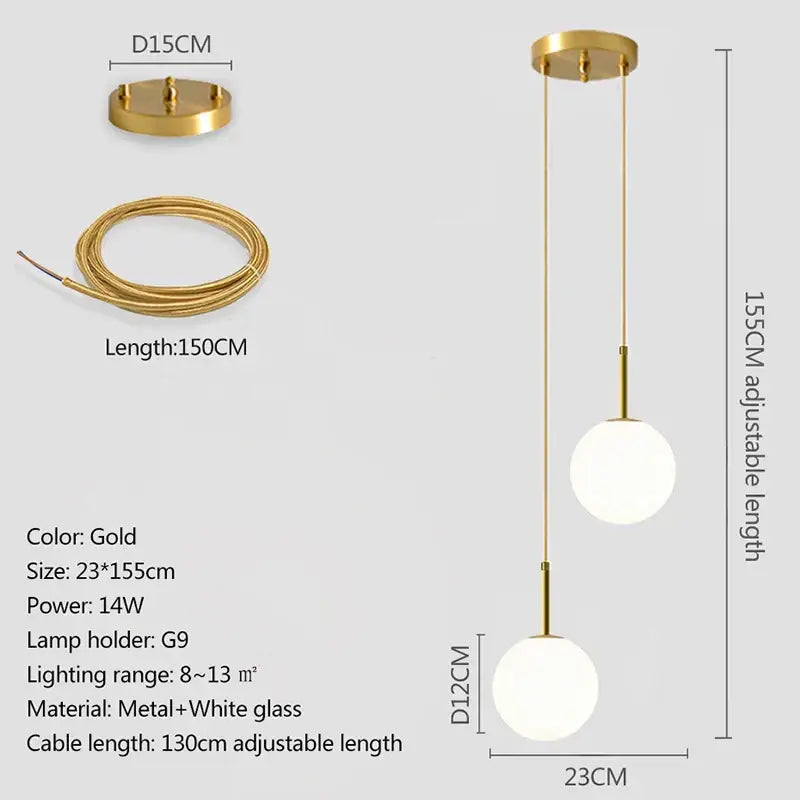 Modern brass pendant light with two smoky gray glass globe shades suspended by adjustable cords for dining room