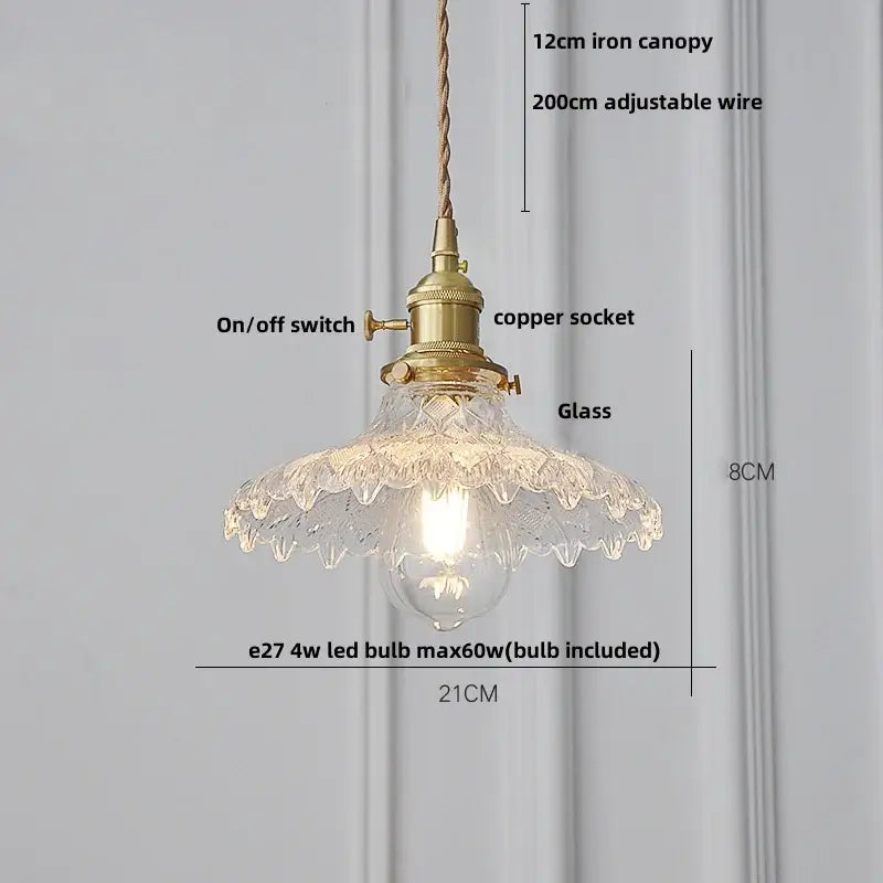 Modern brass pendant light with knob switch featuring a scalloped clear glass shade by decorbites clear glass