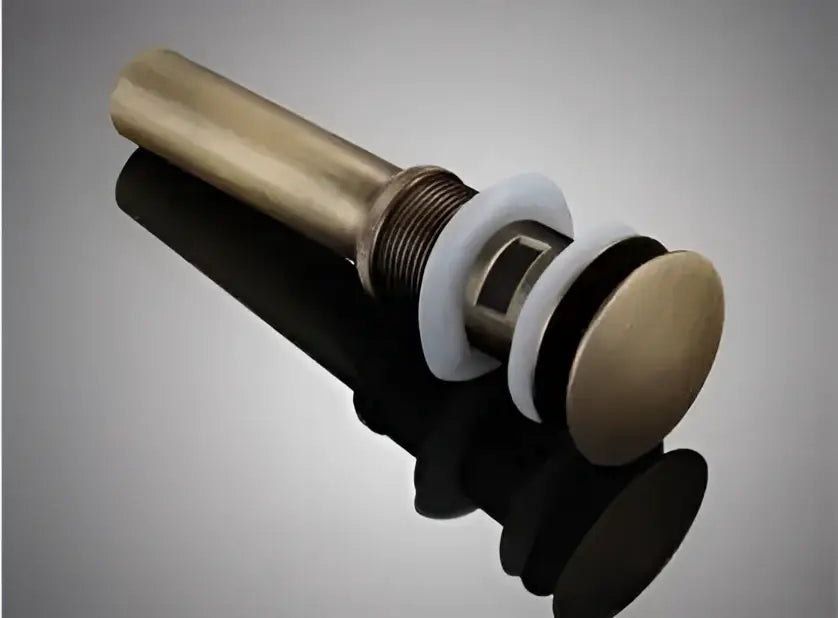 Antique brass basin waste drain stopper with white rubber seal and black gasket for bathroom sink use