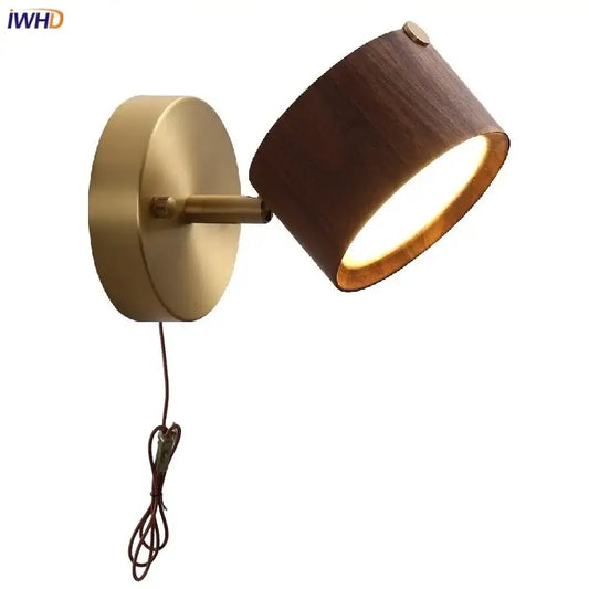 Modern brass and wood base wall sconce with warm-toned spotlight and cylindrical wooden shade by decorbites led wood decor