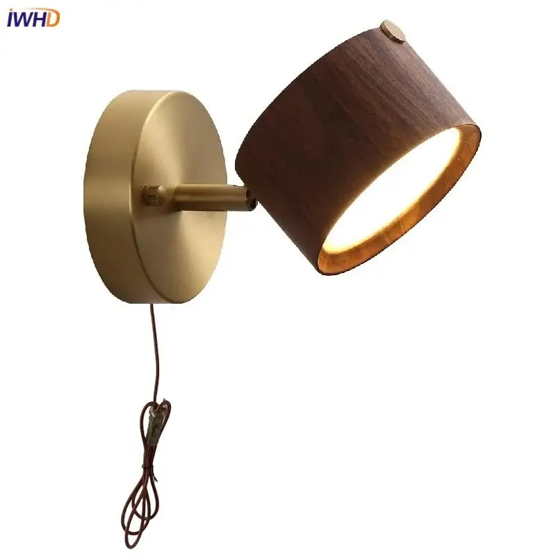 Modern brass and wood base wall sconce with warm-toned spotlight and cylindrical wooden shade by decorbites led wood decor