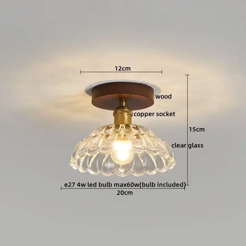Modern brass and wood led ceiling light with dark wood base, brass socket, and clear intricate glass shade for bedroom decorbites ceiling light