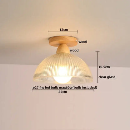 Modern brass and wood led ceiling light featuring a warm-toned natural wood base and clear ribbed glass shade for decorbites ceiling light decor