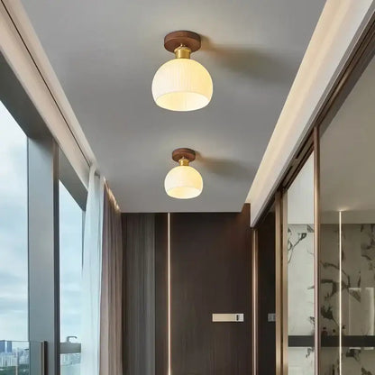 Modern brass and wood led ceiling light with warm-toned spherical frosted glass pendant lights for bedroom decorbites led ceiling