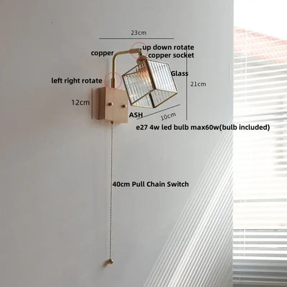 Modern brass and wood led wall lights with a copper finish geometric glass shade and adjustable arm for bedroom use