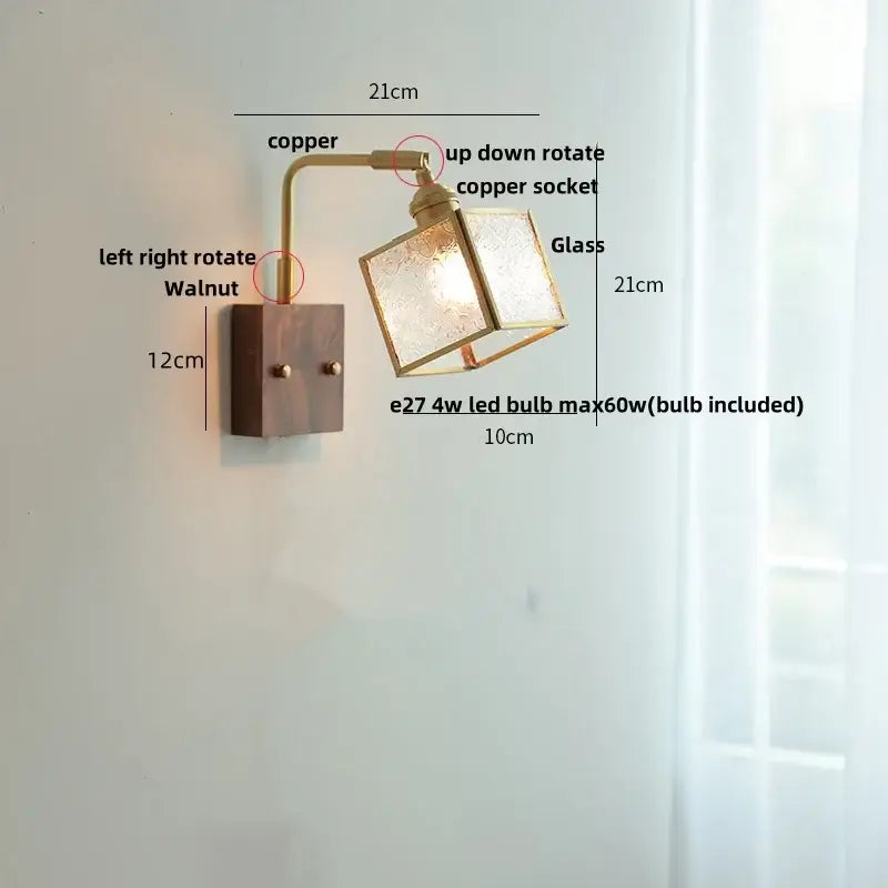 Modern brass and wood led wall lights with walnut base copper arm and etched glass cube shade for bedroom use