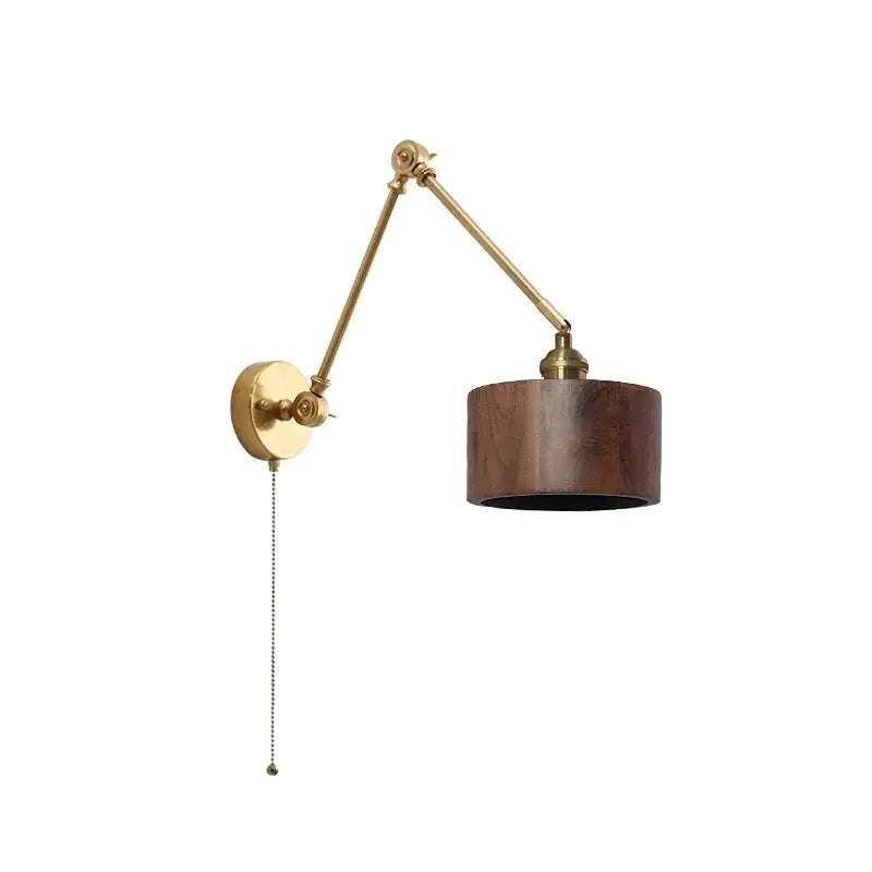 Modern brass and wood led wall sconce with adjustable arm, dark wood cylindrical shade, and pull-chain switch for bedroom use