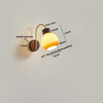 Modern brass and wood led wall sconce pull chain with warm-toned glass globe and dark wood canopy for bedroom decorbites led wall