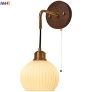 Modern brass and wood ribbed glass wall light with warm-toned globe pendant ideal for bedroom decorbites copper adjustable use