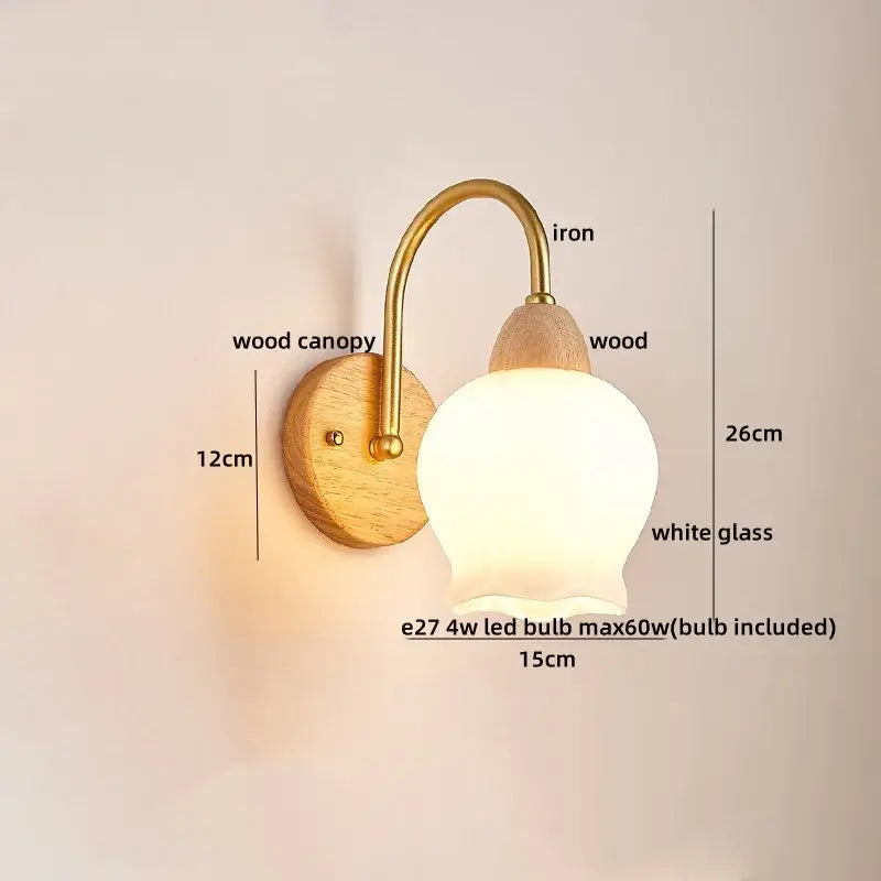 A warm-toned modern brass and wood tulip led wall lamp with a soft white glass shade for living room decorbites led wall Lamps