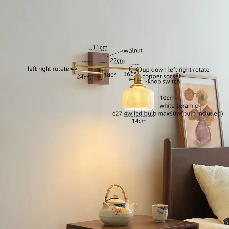 Modern brass and wood wall light featuring a warm-toned brass sconce, white ceramic copper lampshade, and walnut bracket