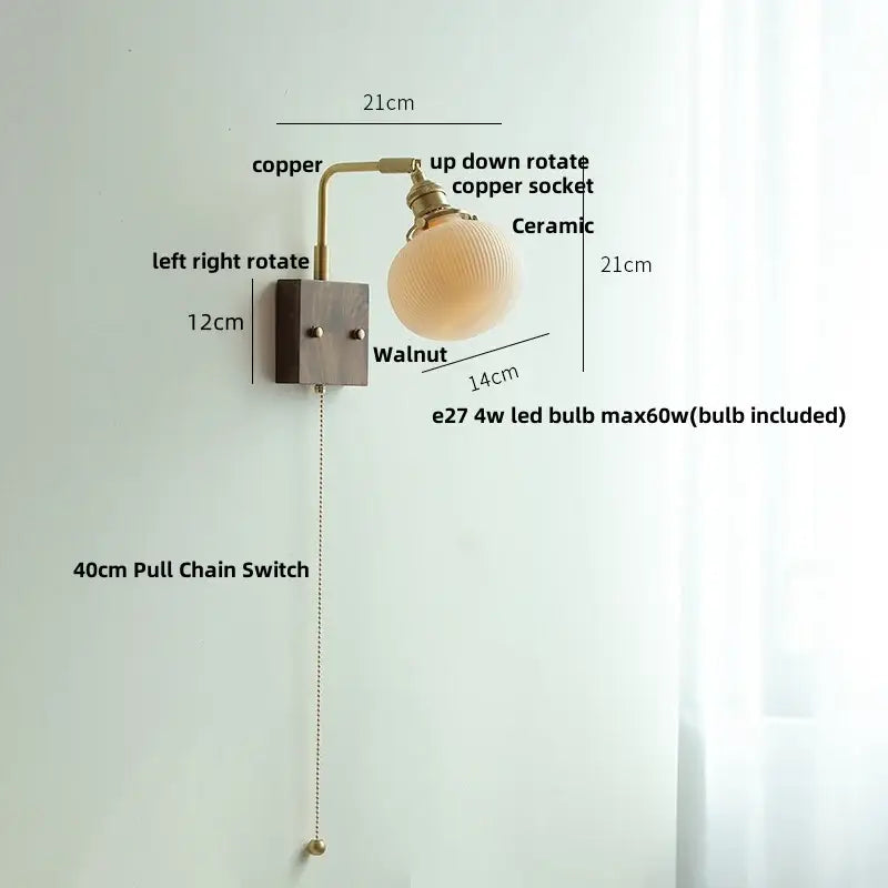 Modern copper-finished adjustable wall light fixture with textured ceramic globe and walnut base for bedroom use