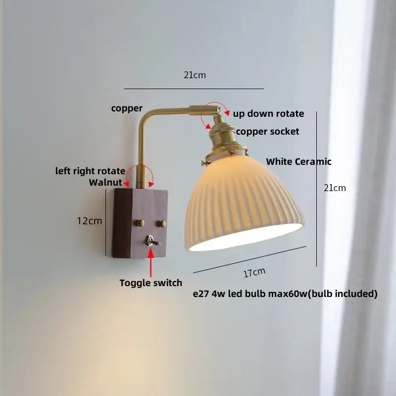 Copper-arm wall light fixture with a white ceramic ribbed lampshade and walnut-finished mounting plate for bedroom use