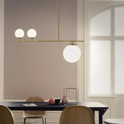 Modern brass ball pendant light with three frosted opal glass globe bulbs for dining room 220v-240v 110v-120v use