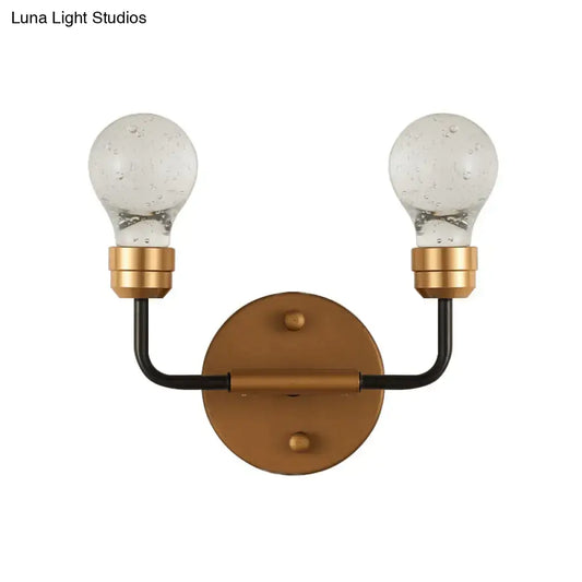 Modern brass and black wall light with two seeded glass bulbs bulb shaped sconce lamp for bedroom use