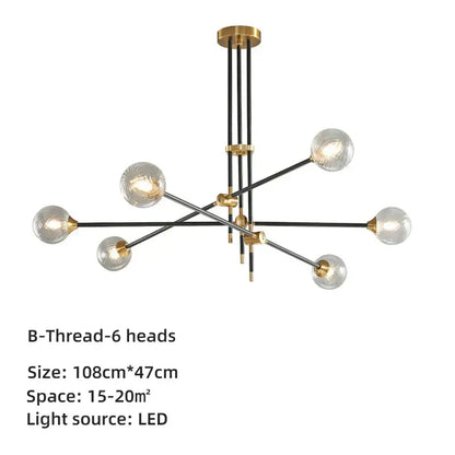 Modern brass and black geometric glass ball chandelier featuring six clear glass globe bulbs with gold accents for dining room decorbites geometric glass chandelier