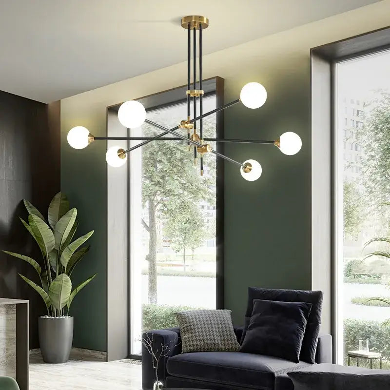 Modern brass and black geometric glass ball chandelier with six white glass bulbs for dining room decorbites geometric glass light