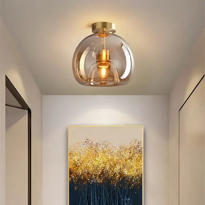 Modern brass and black glass ball led ceiling light with a spherical smoked glass globe for living room decorbites ceiling light