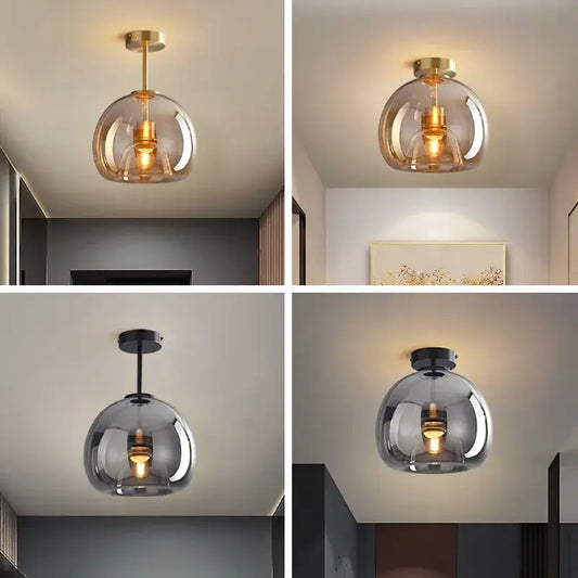 Modern brass and black glass ball led ceiling light with warm-toned bulb for stylish decorbites glass ball use