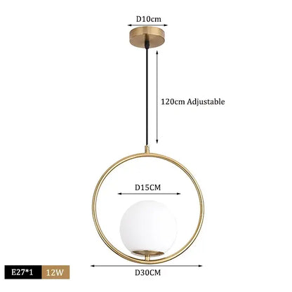 Modern brass and black glass ball pendant light featuring a gold-toned circular frame with a white glass globe decorbites glass ball pendant