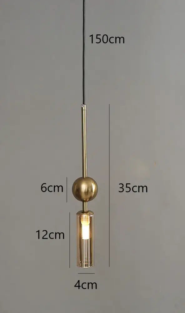 Modern brass and black glass pendant light with sleek design style featuring a spherical top and led bulb compatibility
