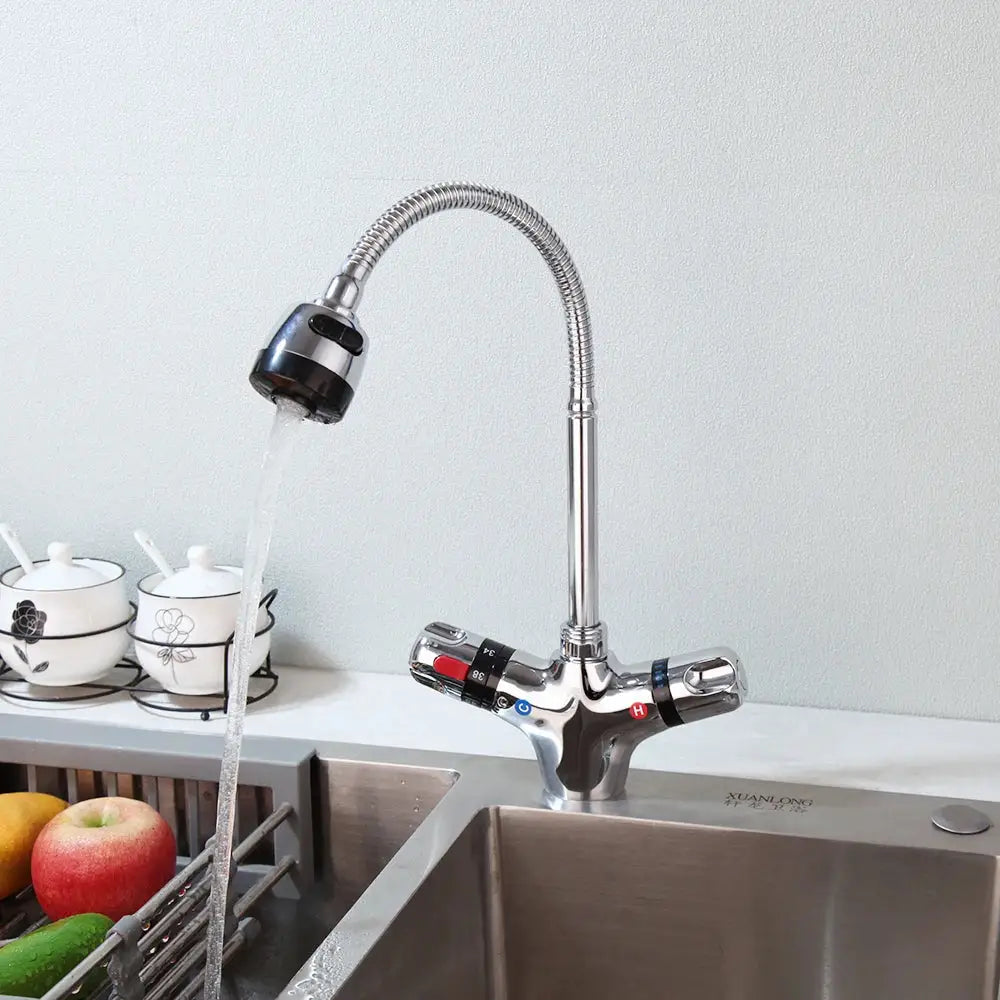Modern brass and black kitchen sink faucet with stainless steel flexible gooseneck spout and dual-handle temperature control