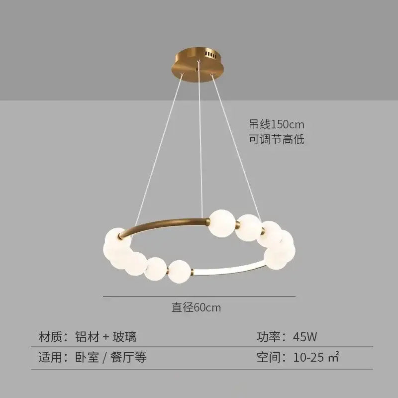 Modern brass circle ring led pendant light featuring gold-toned aluminum and frosted glass bulbs for dining room decorbites circle ring