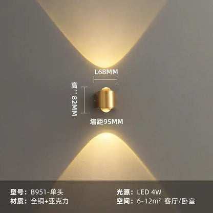 Modern brass copper led wall lamp with gold cylindrical design casting symmetrical warm light for bedroom reading decorbites copper led wall