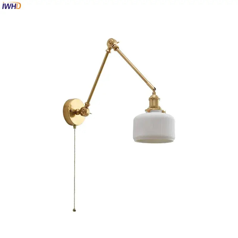 Modern brass copper swing arm wall sconce with white ribbed glass shade and pull-chain switch for bedroom decorbites copper swing