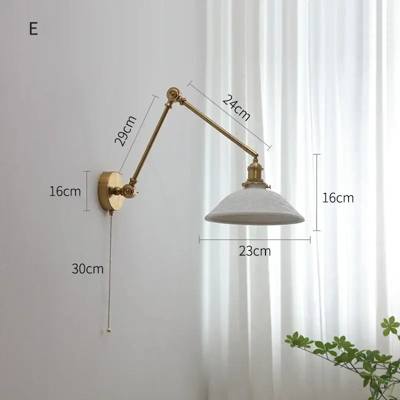 Modern brass copper swing arm wall sconce with adjustable brass finish and white textured ribbed glass shade decorbites copper swing