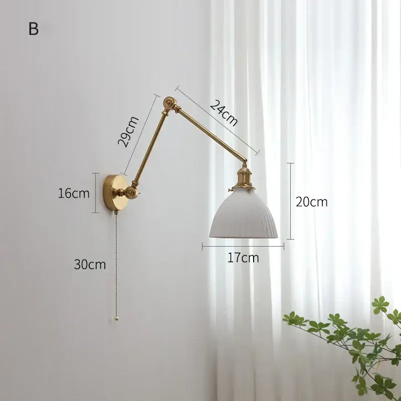 Modern brass copper swing arm wall sconce with adjustable brass finish and white ceramic shade for bedroom decorbites copper swing