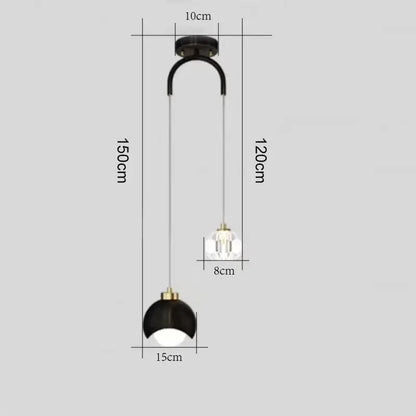 Modern brass crystal ball pendant light with black and gold curved arm featuring crystal ball pendant lamp heads for decorbites
