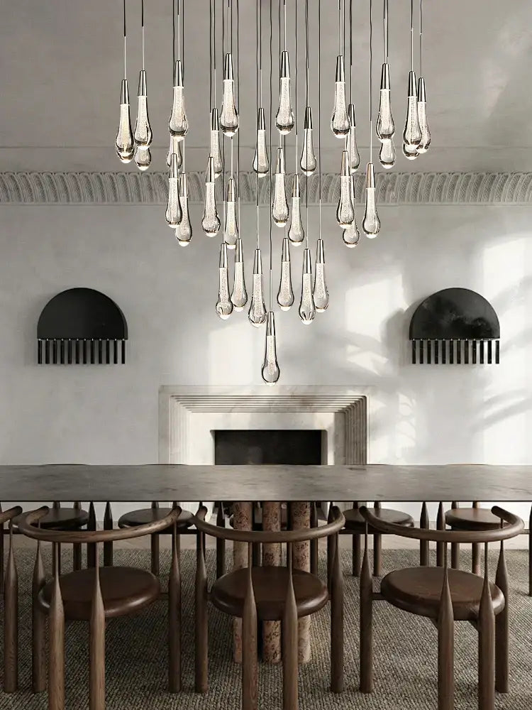 Modern brass crystal ceiling pendant light with teardrop-shaped glass and metallic fixtures for dining room decorbites brass crystal