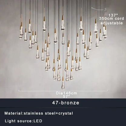 Modern brass crystal ceiling pendant light featuring 47 clear crystal teardrop pendants on decorbites brass crystal arms