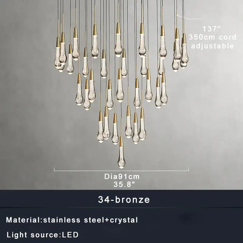 Modern brass crystal ceiling pendant light with teardrop-shaped crystal pendants and bronze-finished cords for dining room decorbites brass crystal