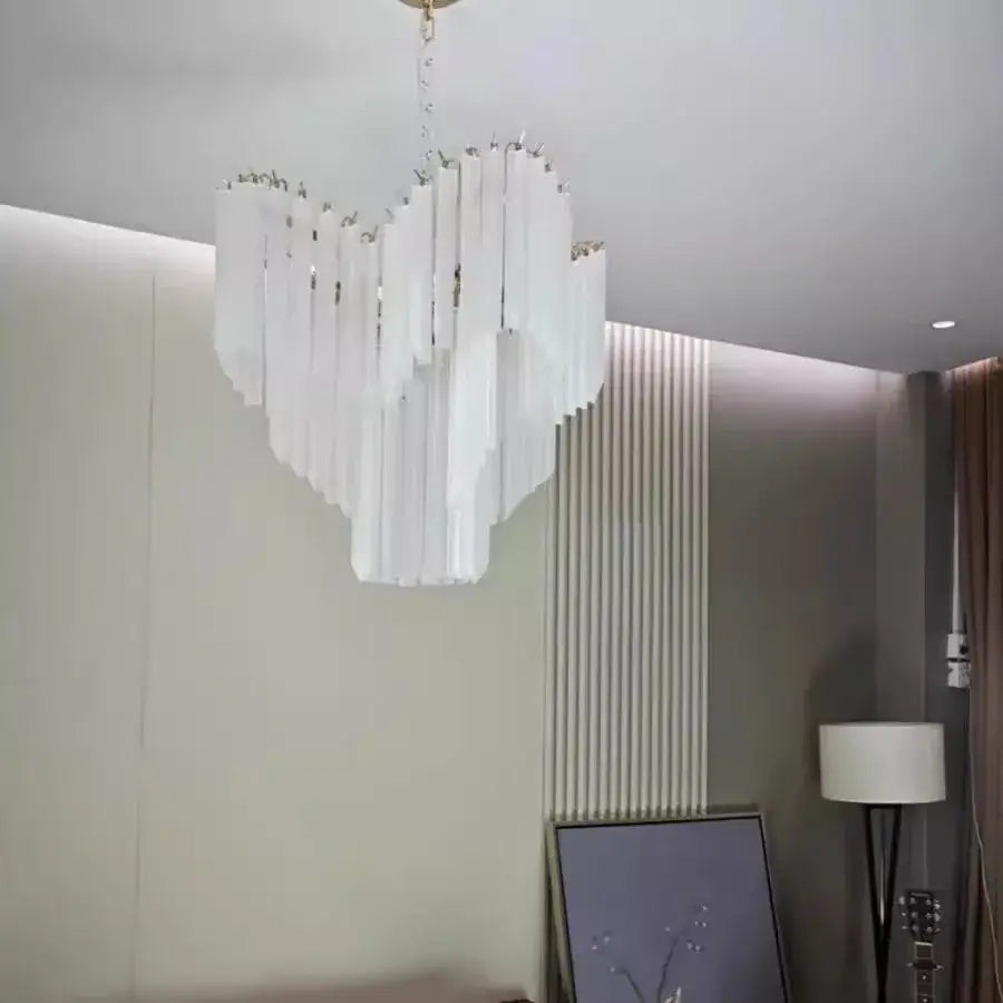 Modern brass crystal glass chandelier with white heart shape and cascading glass panels for dining room decorbites crystal glass