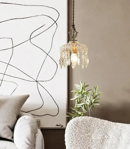 Modern brass crystal led ceiling light featuring an ornate vintage-style pendant with brass finish and crystal droplets