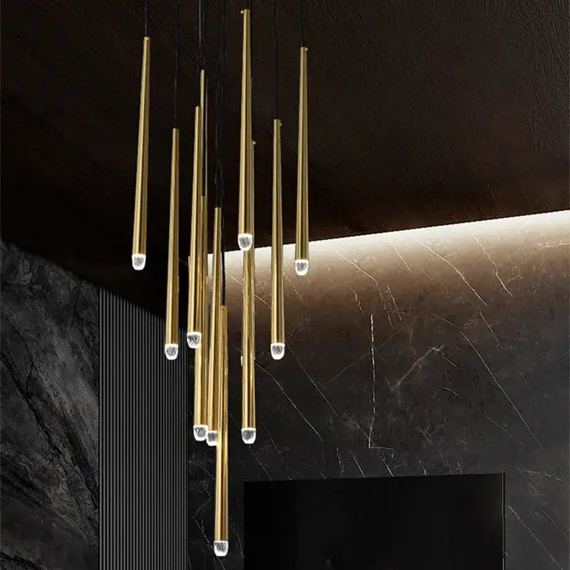 Modern brass crystal led pendant chandelier with gold-toned rods and clear glass caps for villa stairs decorbites crystal led